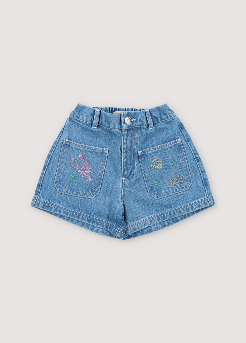 Kostas Short in 100% cotton denim fabric. Shorts with two front pockets and characteristic collection embroideries.