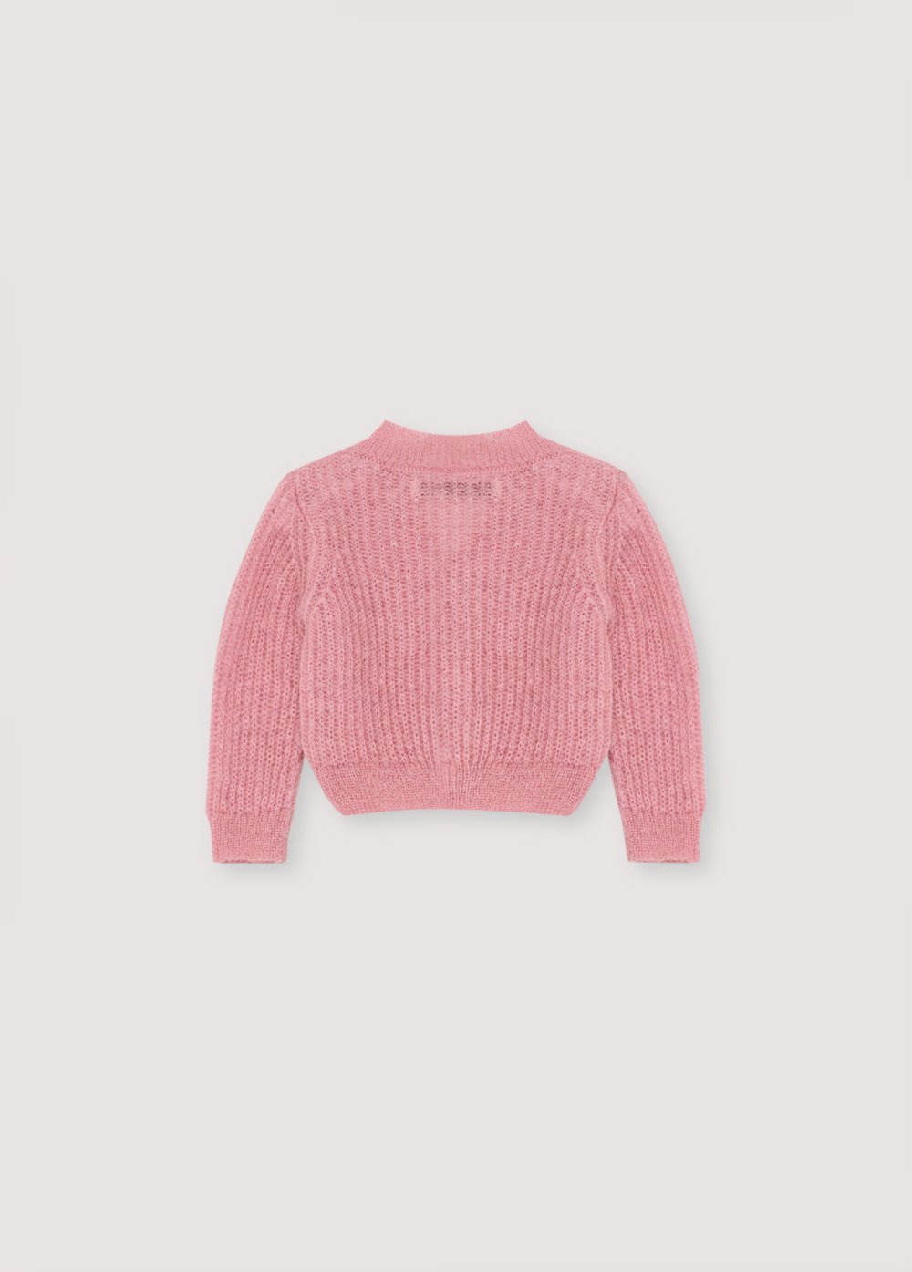 Cardigan en mohair en fine côte avec une encolure V et des boutons originaux en forme de cœur argentés. Il s'associe parfaitement avec des leggings en tricot assortis pour un look complet.