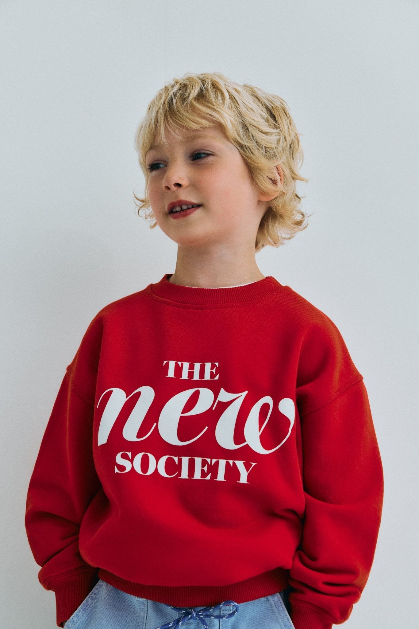 Keep your little one warm and stylish with this vibrant red The New Society sweatshirt. Designed for everyday wear, this kids’ sweatshirt combines a modern design with a soft, comfortable fabric, ensuring all-day comfort.