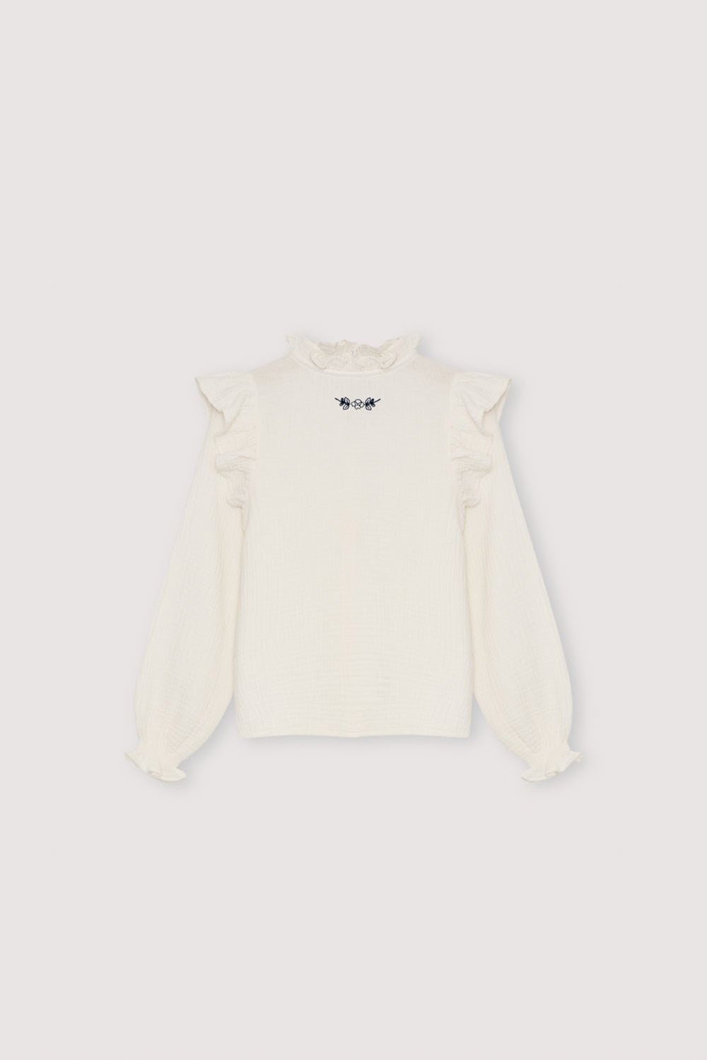 One of our signature double gauze blouse styles, featuring a contrasting embroidery detail at the front for a subtle yet elegant touch. Made from soft, breathable 100% cotton.