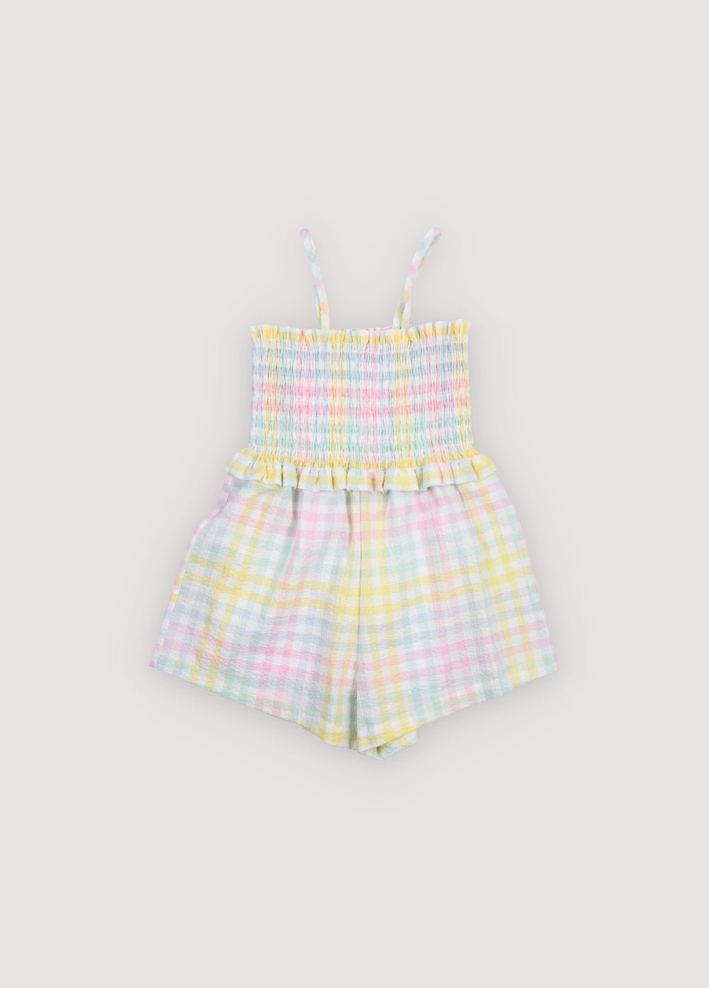 Cotton jumpsuit in lightweight seersucker fabric with a pretty colorful check pattern.