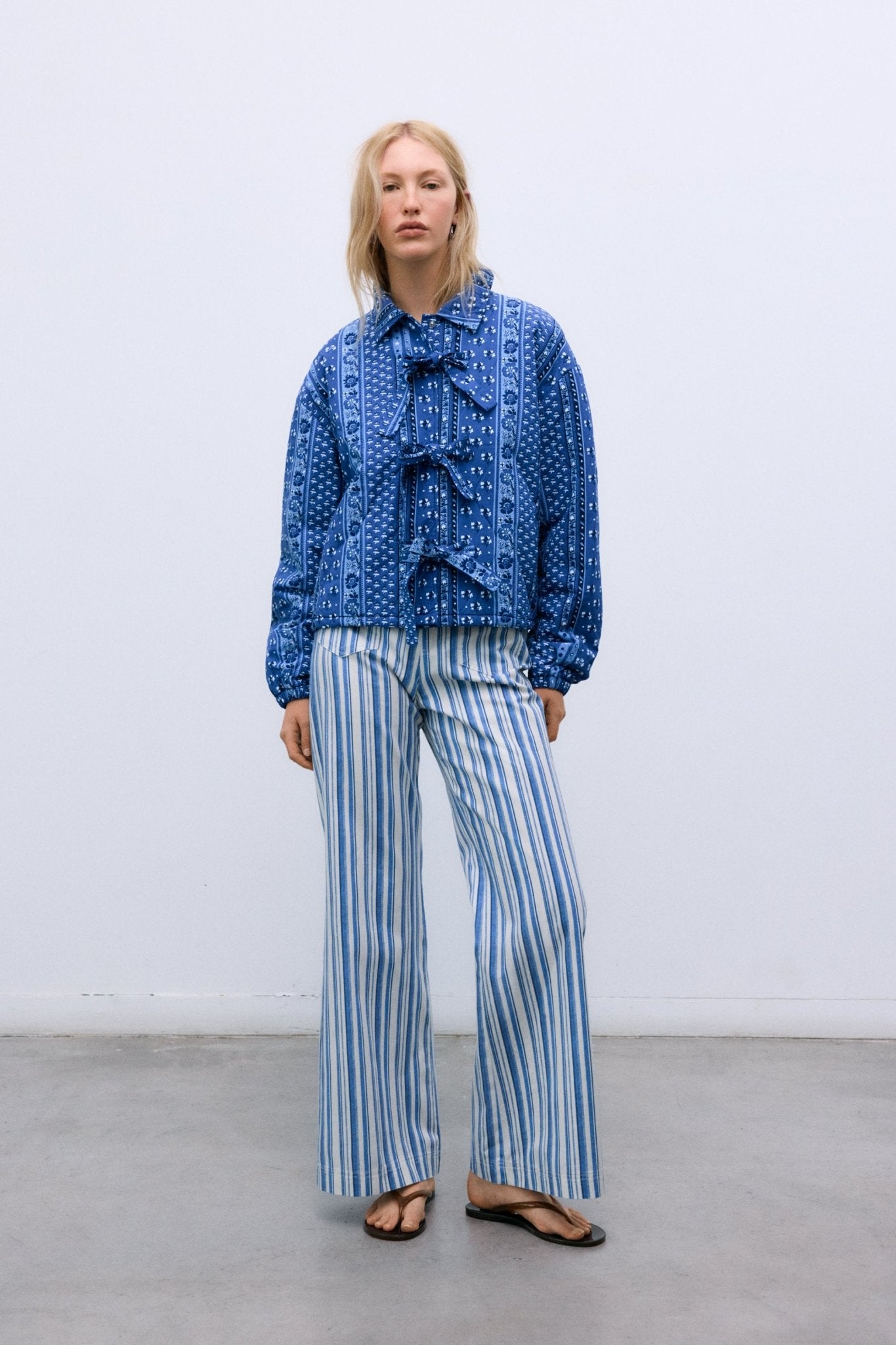 Quilted cotton jacket designed for lightweight comfort during the spring and summer seasons.