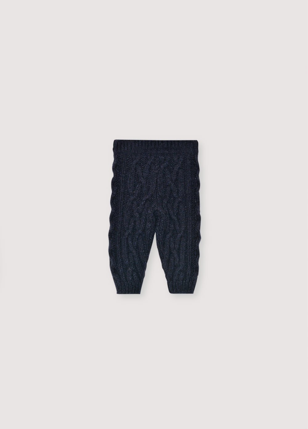Pantalon en maille avec taille et poignets côtelés. Livré avec un cardigan assorti pour compléter le look. Fabriqué avec des matériaux recyclés de haute qualité.