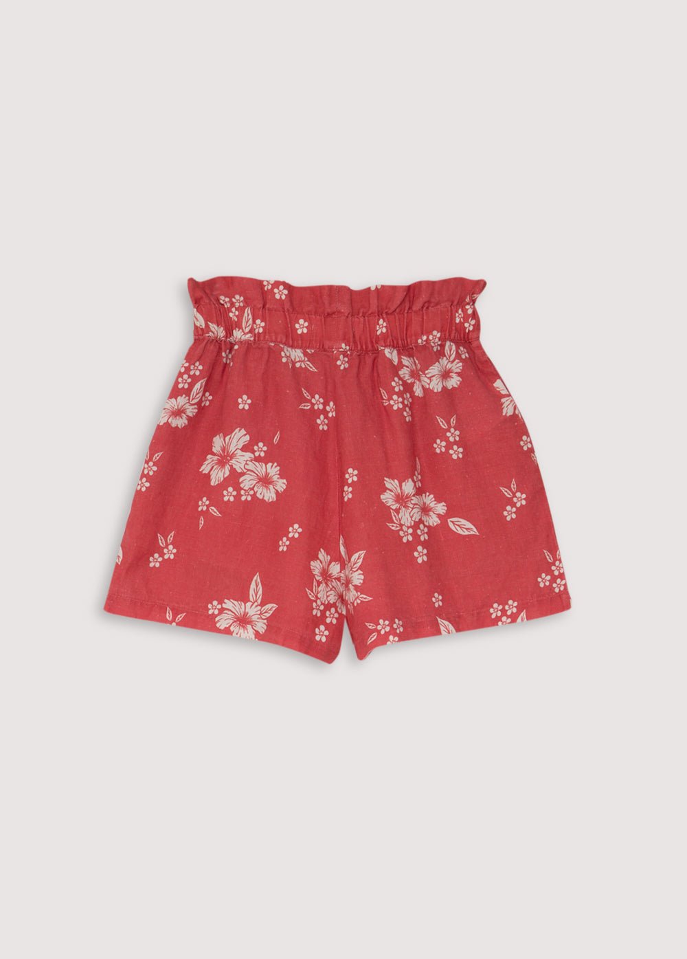 Nauplia Teen Short in 100% linen with our chili beach flowers print. Wide shorts with ruffle detail on the waistband. Spring Summer Collection. The New Society.