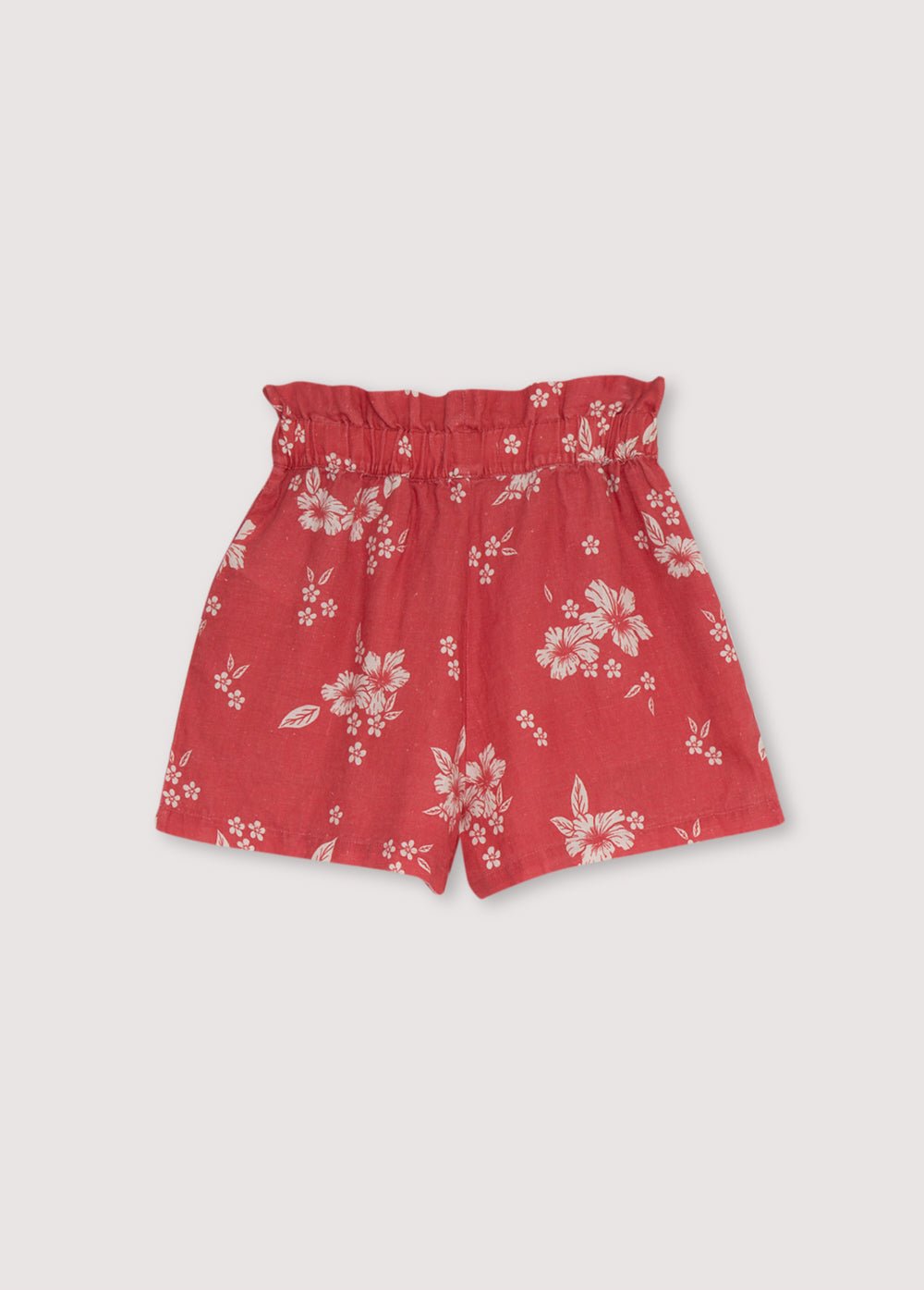 Nauplia Teen Short in 100% linen with our chili beach flowers print. Wide shorts with ruffle detail on the waistband. Spring Summer Collection. The New Society.