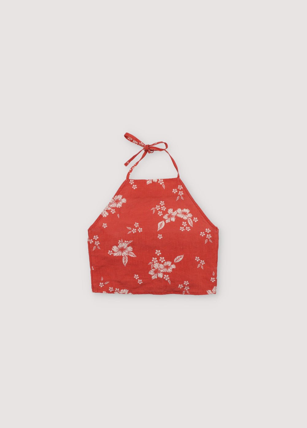 Nauplia Teen Top in 100% linen with our chili beach flowers print, featuring a halter neckline and tied back with a bow. Spring Summer Collection. The New Society.