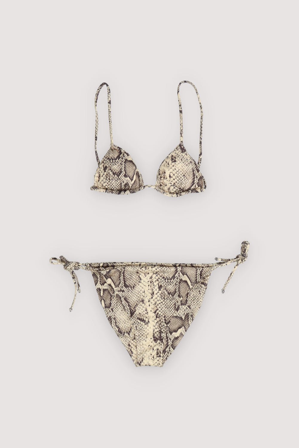 Turn heads with this stylish snake-print bikini, designed with adjustable straps on both the top and bottom to ensure a perfect, personalized fit. Sleek, comfortable, and made for confident summer vibes.