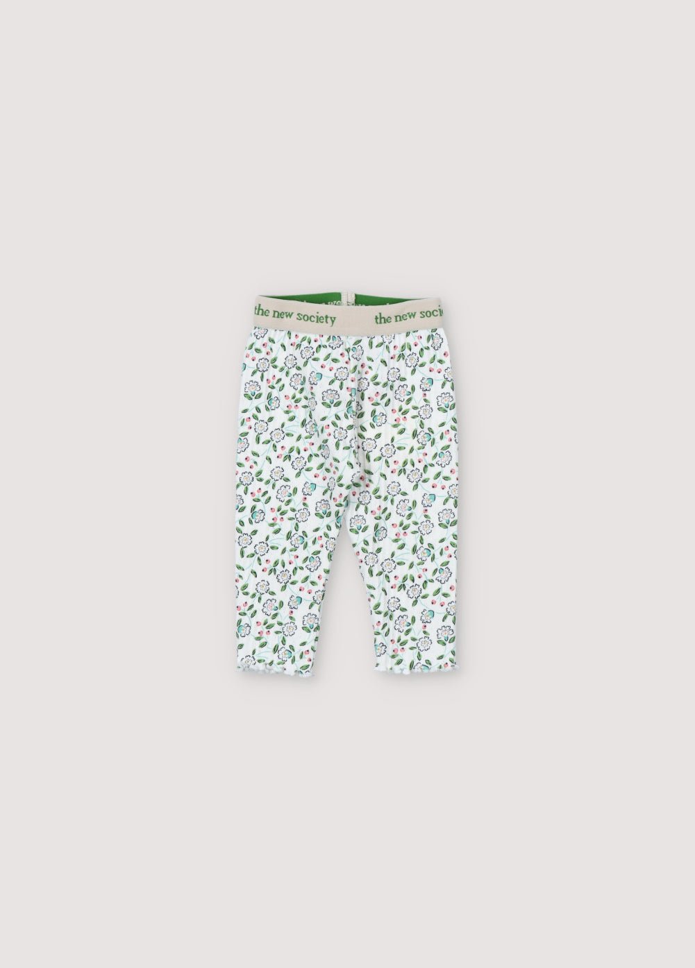 Legging côtelé ajouré avec un joli imprimé fleuri. Il présente une taille élastique avec un logo contrasté et un ourlet fini avec un surjet pour bébé. Parfait à associer avec le t-shirt assorti. Collection Printemps Été. The New Society.