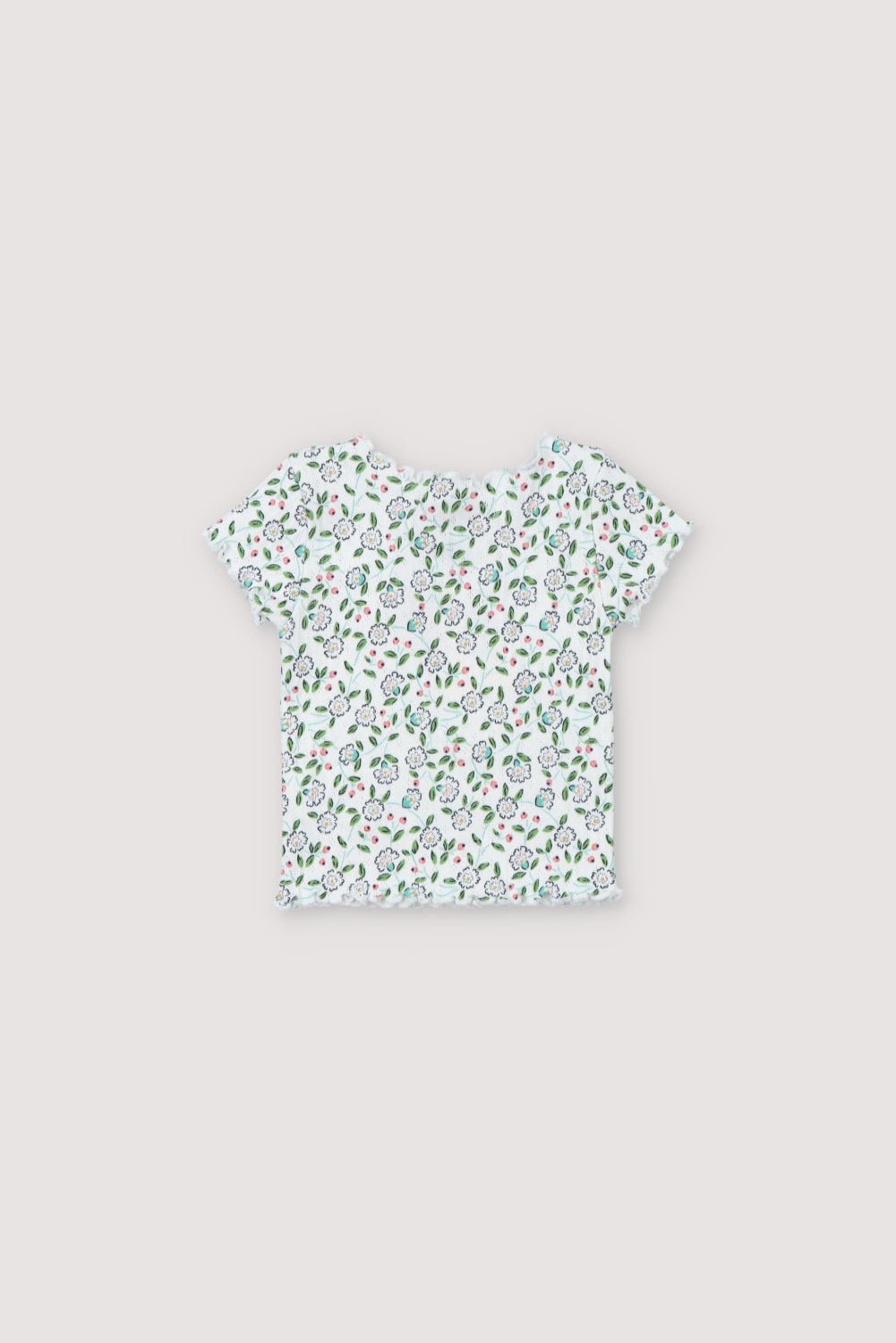 T-shirt côtelé à manches courtes avec un joli imprimé fleuri et des finitions baby overlock au col, aux poignets et à la base. Il est livré avec des leggings assortis. Collection Printemps Été. The New Society.