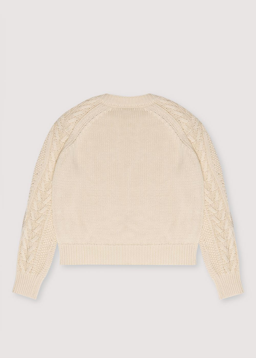 One of our best-selling sweaters. Knitted with an original structure and featuring a pleat detail on the sleeve. Sprin Summer Collection. The New Society.