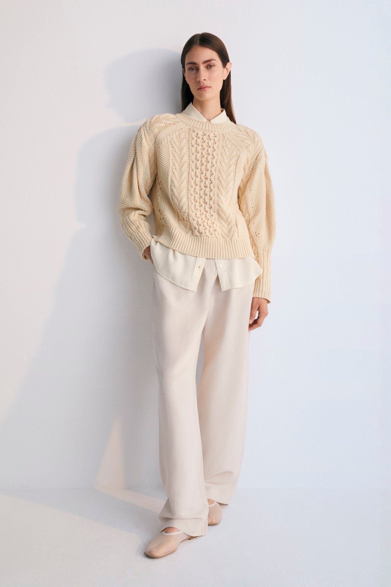 One of our best-selling sweaters. Knitted with an original structure and featuring a pleat detail on the sleeve. Sprin Summer Collection. The New Society.