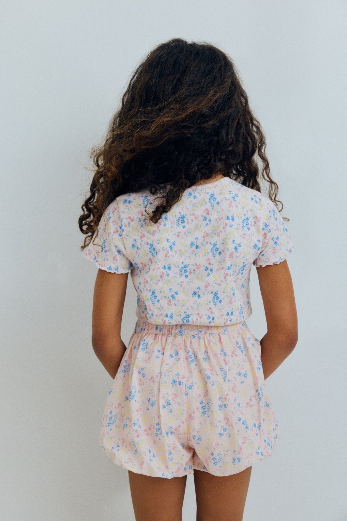 Organic cotton shorts with a beautiful floral print and a balloon style silhouette, creating a playful and distinctive shape.