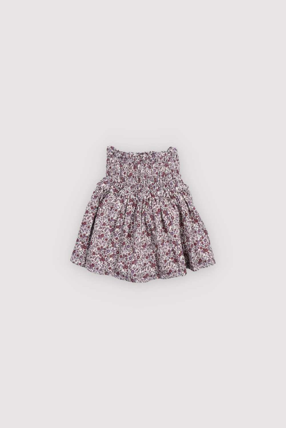 Our classic skirt style, now in double gauze with a beautiful floral print. It features smocked detailing and comes with a matching blouse to complete the look.