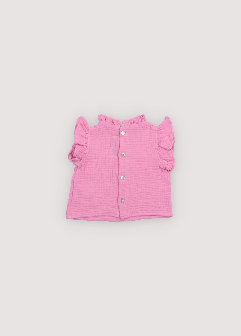 Blouse bébé Spyros en tissu mousseline 100% coton dans notre couleur hibiscus. Broderie TNS Kids assortie. Collection Printemps Été. The New Society.
