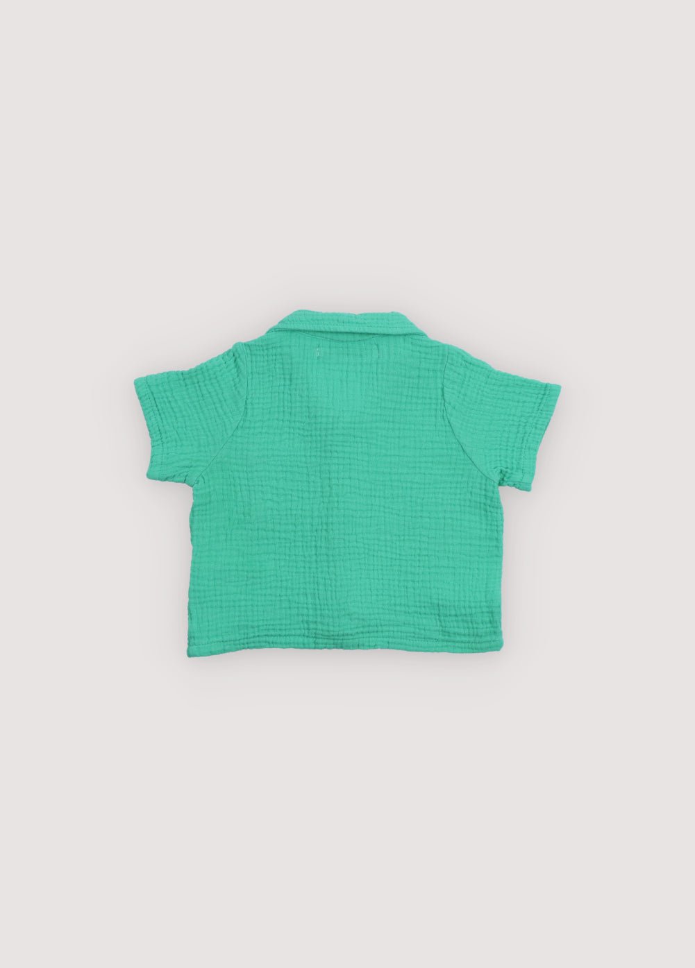 Chemise bébé Spyros en tissu mousseline 100% coton dans notre couleur jade. Broderie TNS Kids assortie. Collection Printemps Été. The New Society.