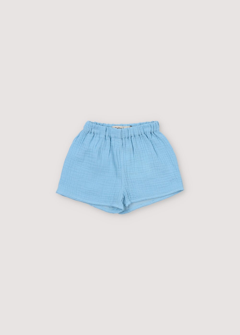 Short bébé Spyros en tissu mousseline 100% coton dans notre coloris bleu poudré. Broderie TNS Kids assortie. Collection Printemps Été. The New Society.