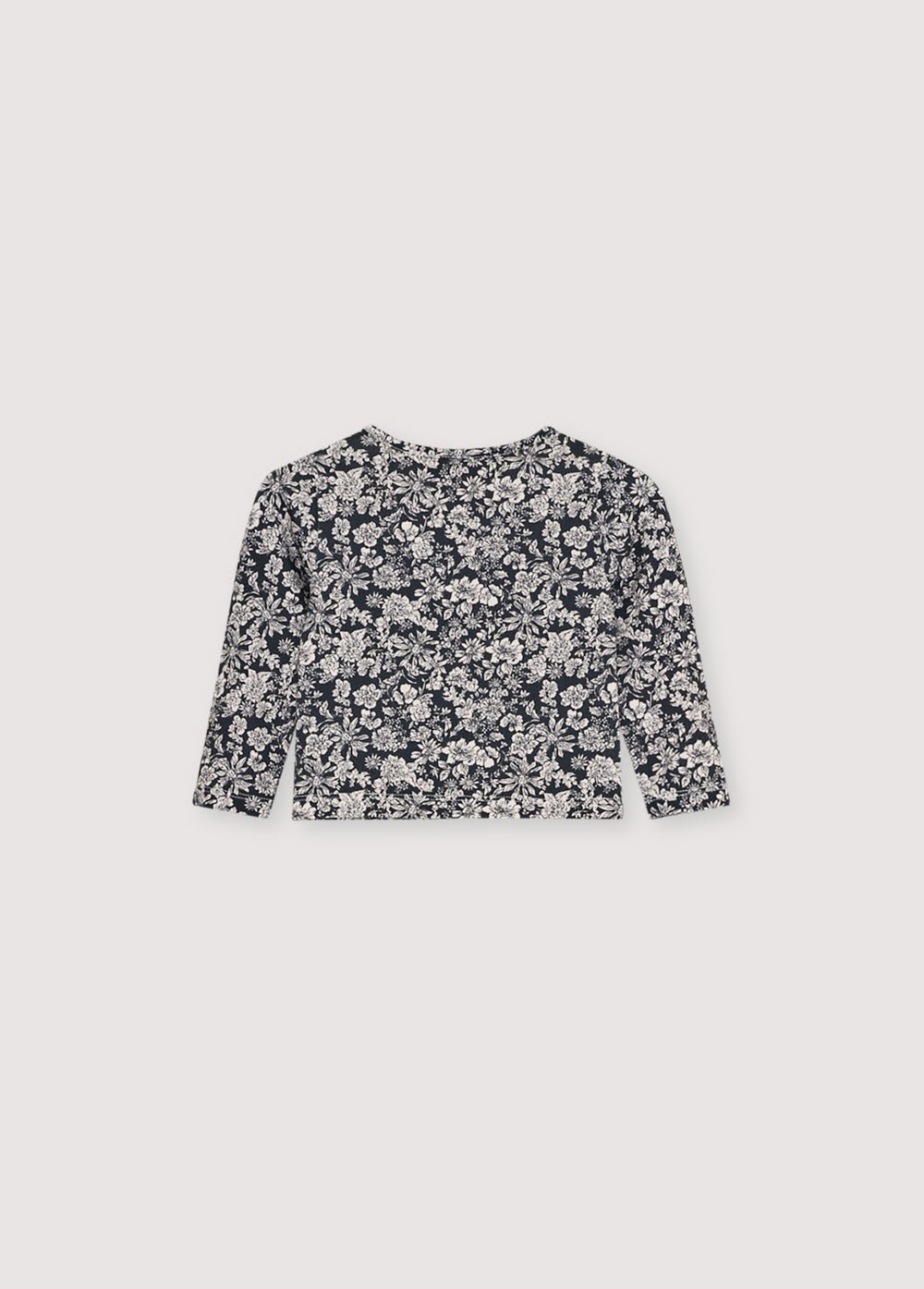 ラウンドネックと花柄のジャージー T シャツ。トーンオントーンのスナップが付いた肩の開口部が特徴です。同系色のレギンスと合わせてトータルルックを完成させましょう