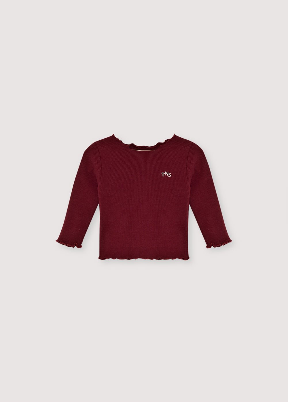 トーンオントーンのベビーオーバーロック仕上げのクラシックなリブTシャツ。同素材のレギンスと合わせてトータルルックを完成させましょう。 胸元にはロゴ刺繍が入っています。