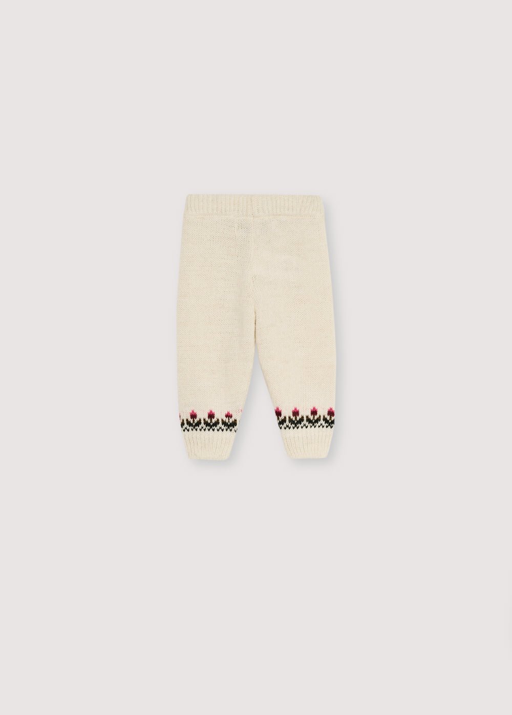 柔らかなアルパカとウールの混紡素材を使用したパンツ。ウエストバンドと袖口はリブ編みになっています。裾にカラフルなジャカード織のディテールが施されています。同素材のカーディガンと合わせると、トータルなコーディネートが完成します。