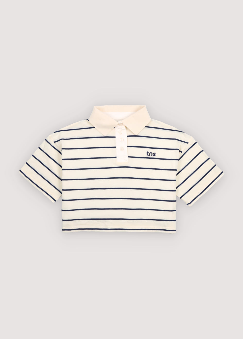 Cropped polo crafted in soft piqué fabric, featuring contrasting stripes and a structured twill collar.