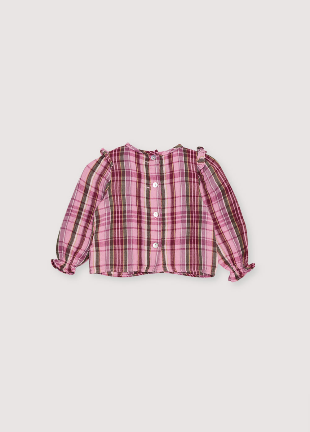 
Baby blouse in checkered double gauze with a smocked yoke and ruffle detail. It features a back opening with a placket and buttons. Perfect for pairing with the matching bloomer.