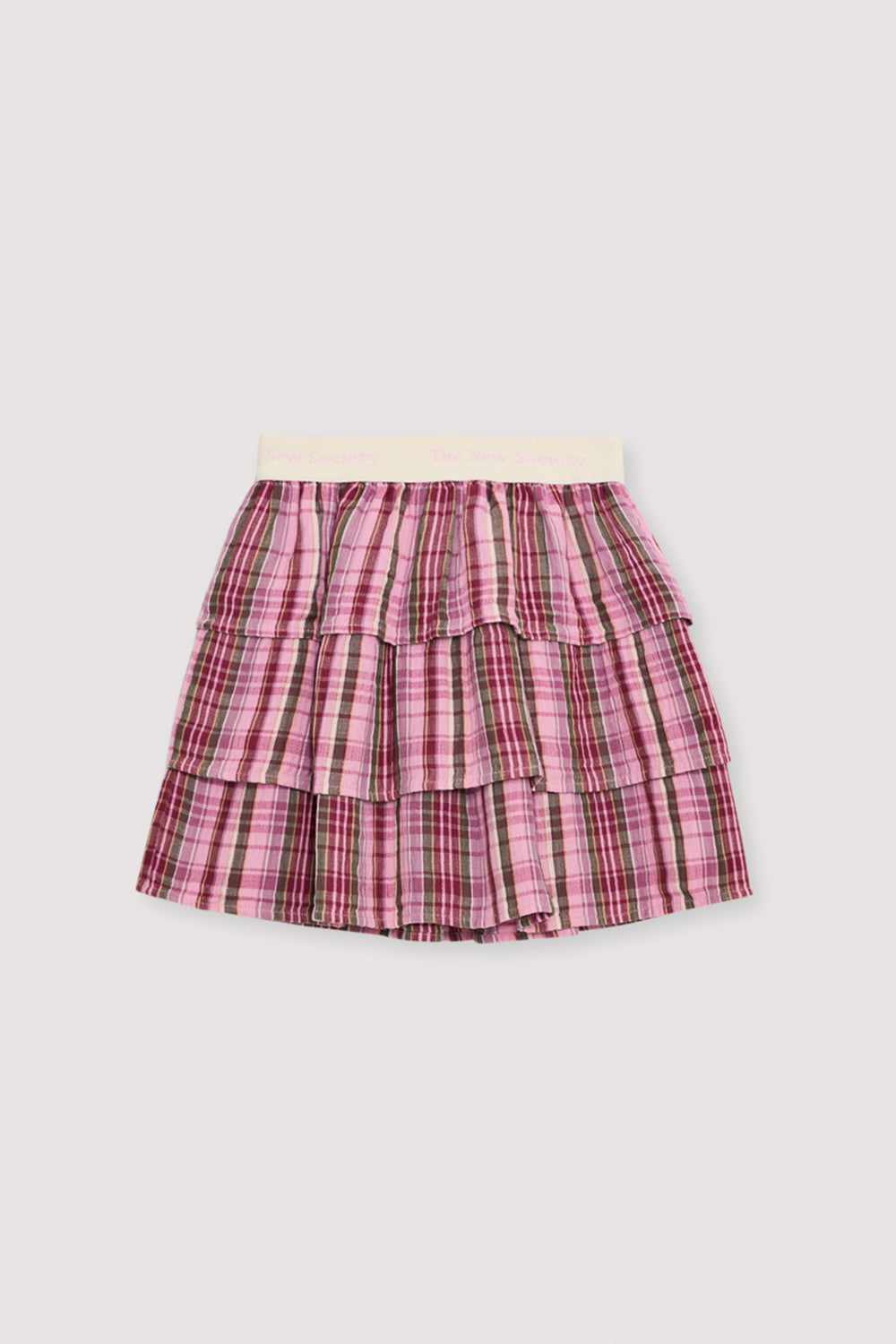 Checkered skirt in double gauze fabric with three ruffles and a branded elastic waistband. Perfect for pairing with the matching blouse.