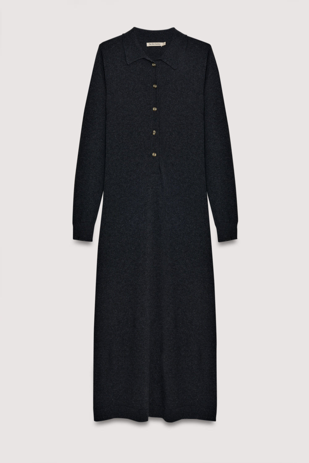 Long dress in fine knit made of cashmere and wool. It features ribbed cuffs and neckline with a placket and buttons.