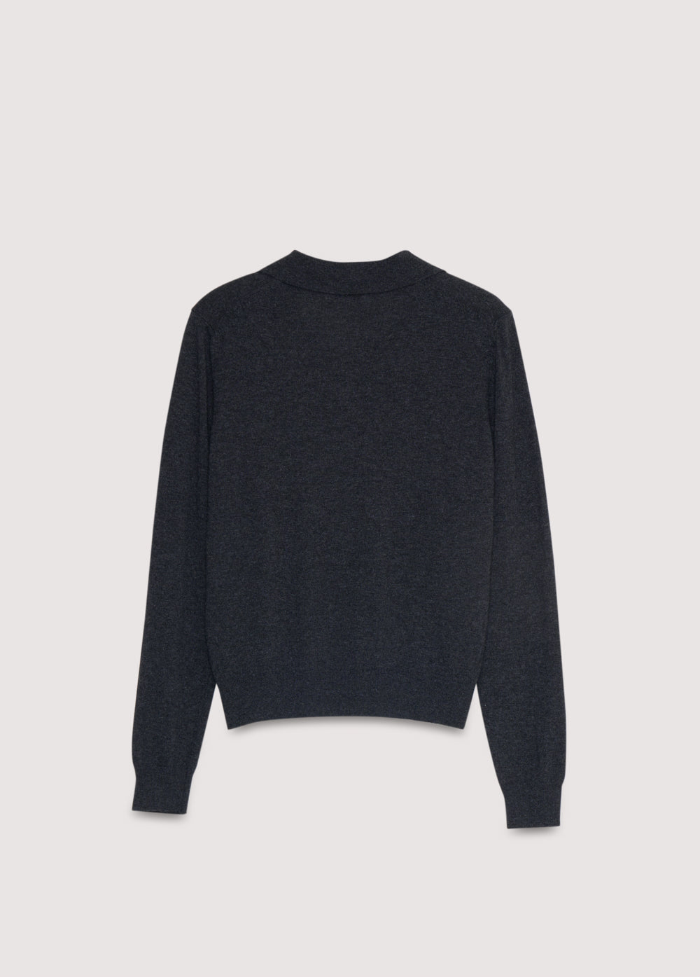 Fine-knit polo in cashmere and wool, with ribbed cuffs and hem, and a ribbed collar with a button placket.