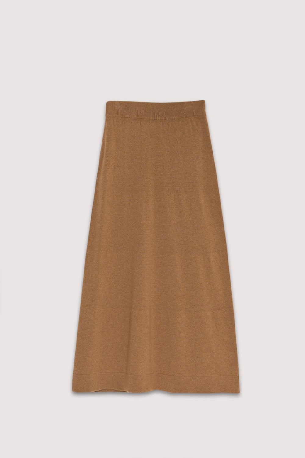 Midi knit skirt in cashmere and wool. It has an A-line shape and an elastic waistband.