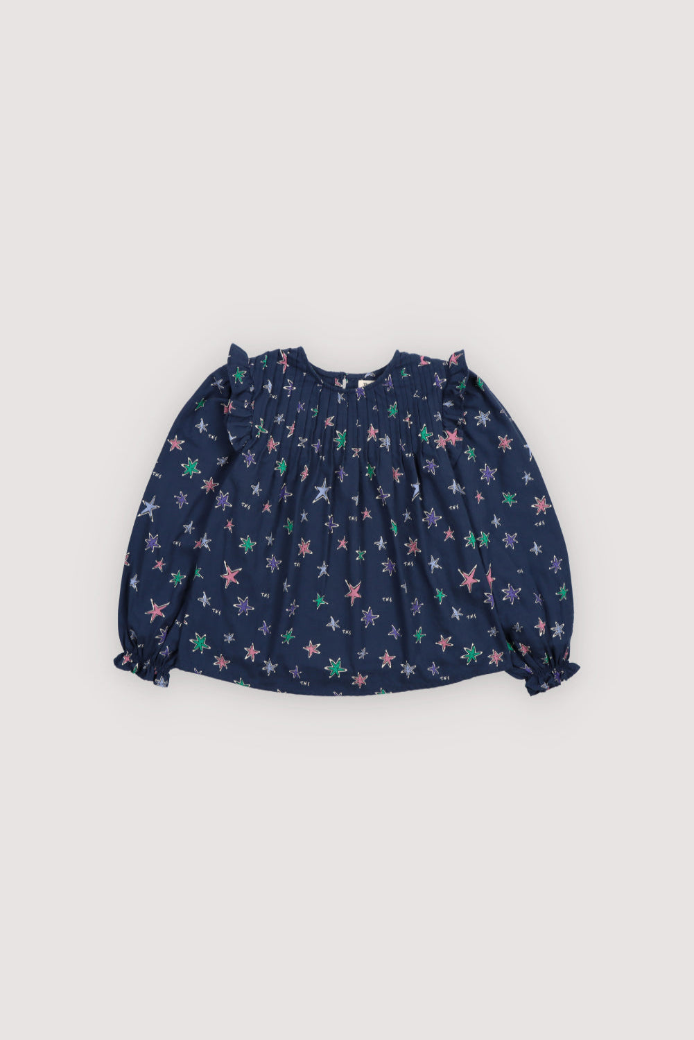 Soft flannel blouse in the vibrant Althea print, featuring a colorful all-over star pattern that adds charm and personality. The New Society. New Collection. Kids 