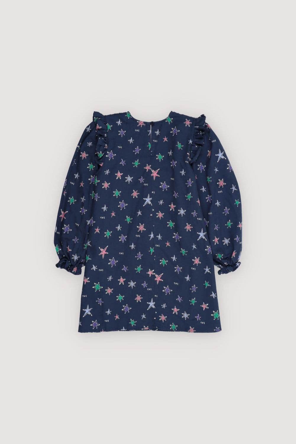 This short flannel dress in the Althea Print features a vibrant, all-over star pattern that brings color and charm to cooler days