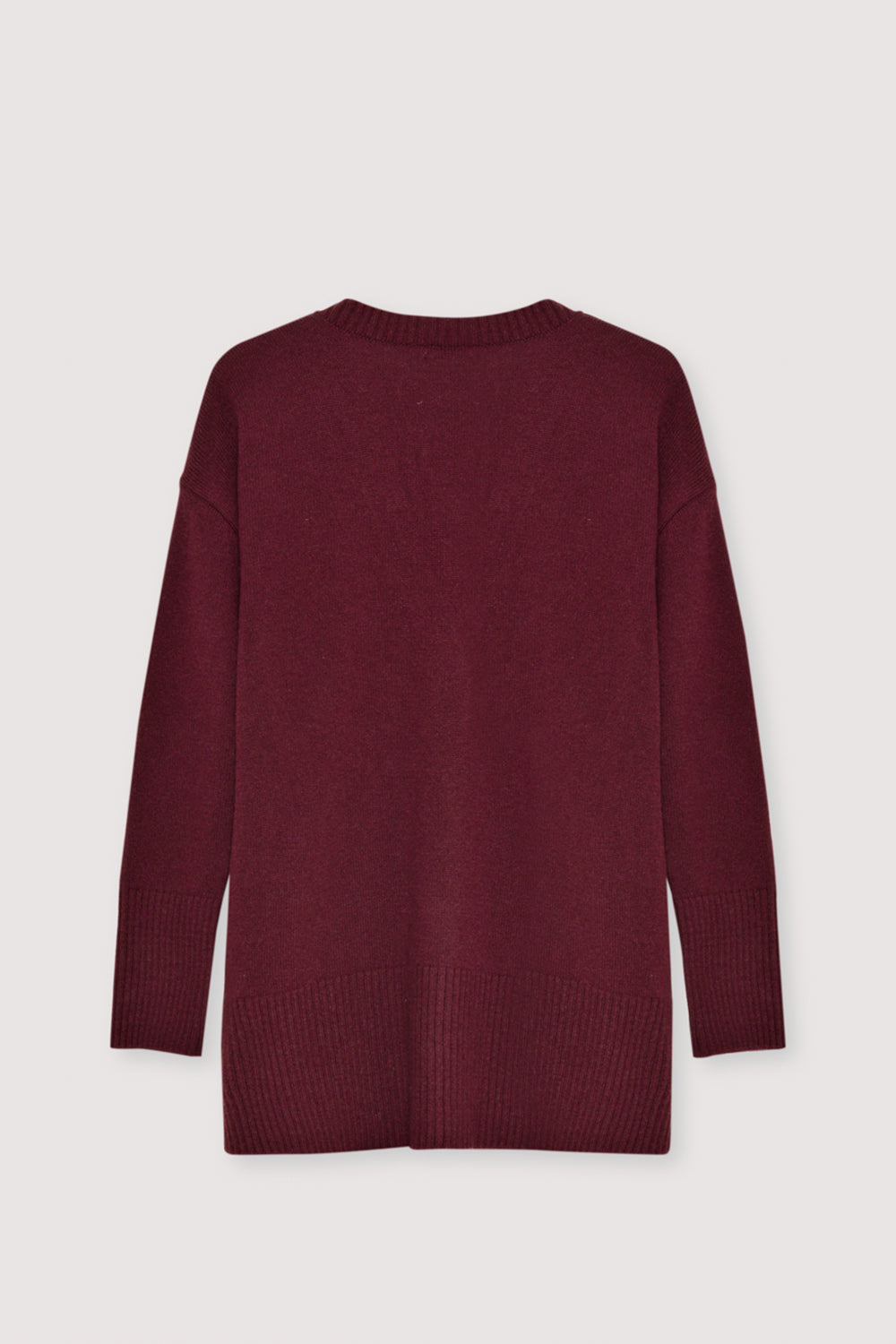 Oversized cashmere cardigan crafted for a relaxed, cozy fit, featuring tone-on-tone buttons for a clean, minimalist look. Perfect for layering, it combines luxurious softness with effortless style for everyday wear.