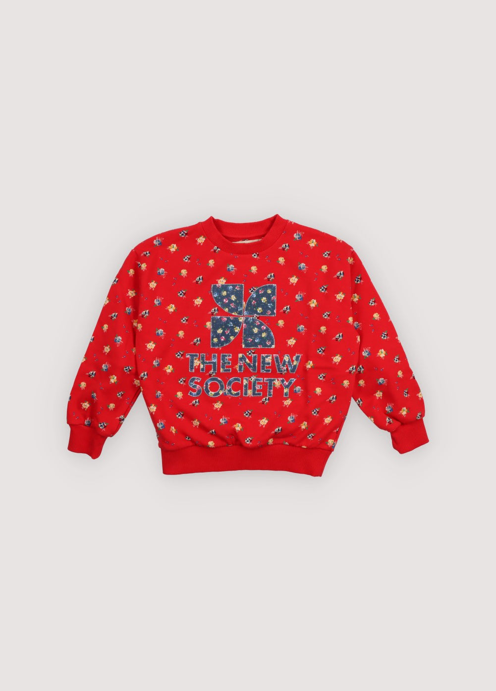 Our classic logo sweatshirt is crafted from 100% soft cotton for everyday comfort and timeless wear. Reimagined with a fresh multicolor floral print, it features a floral-print patch logo and contrasting stitch details that bring a quiet yet expressive energy to the piece.