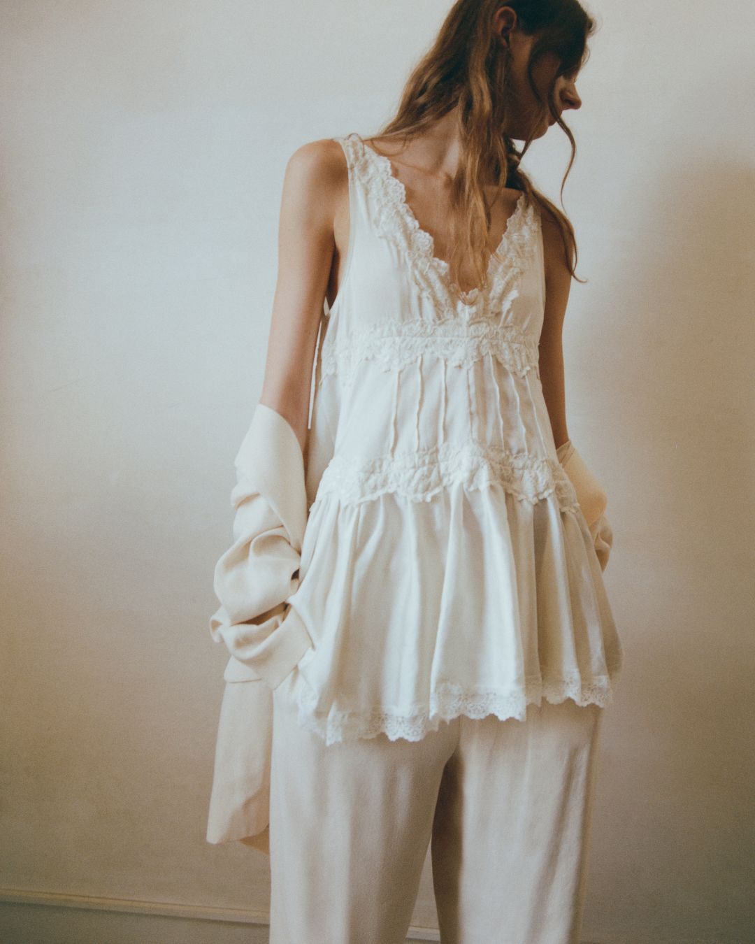 Sustainable organic cotton tunic with fluid cut and minimalist design, wearable as a dress or overshirt