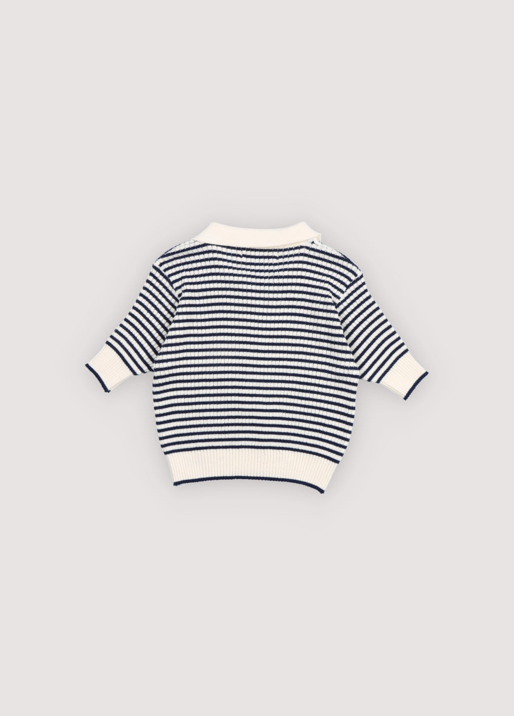 A lightweight knit polo with classic sailor style stripes and a subtle branded embroidery on the rib.