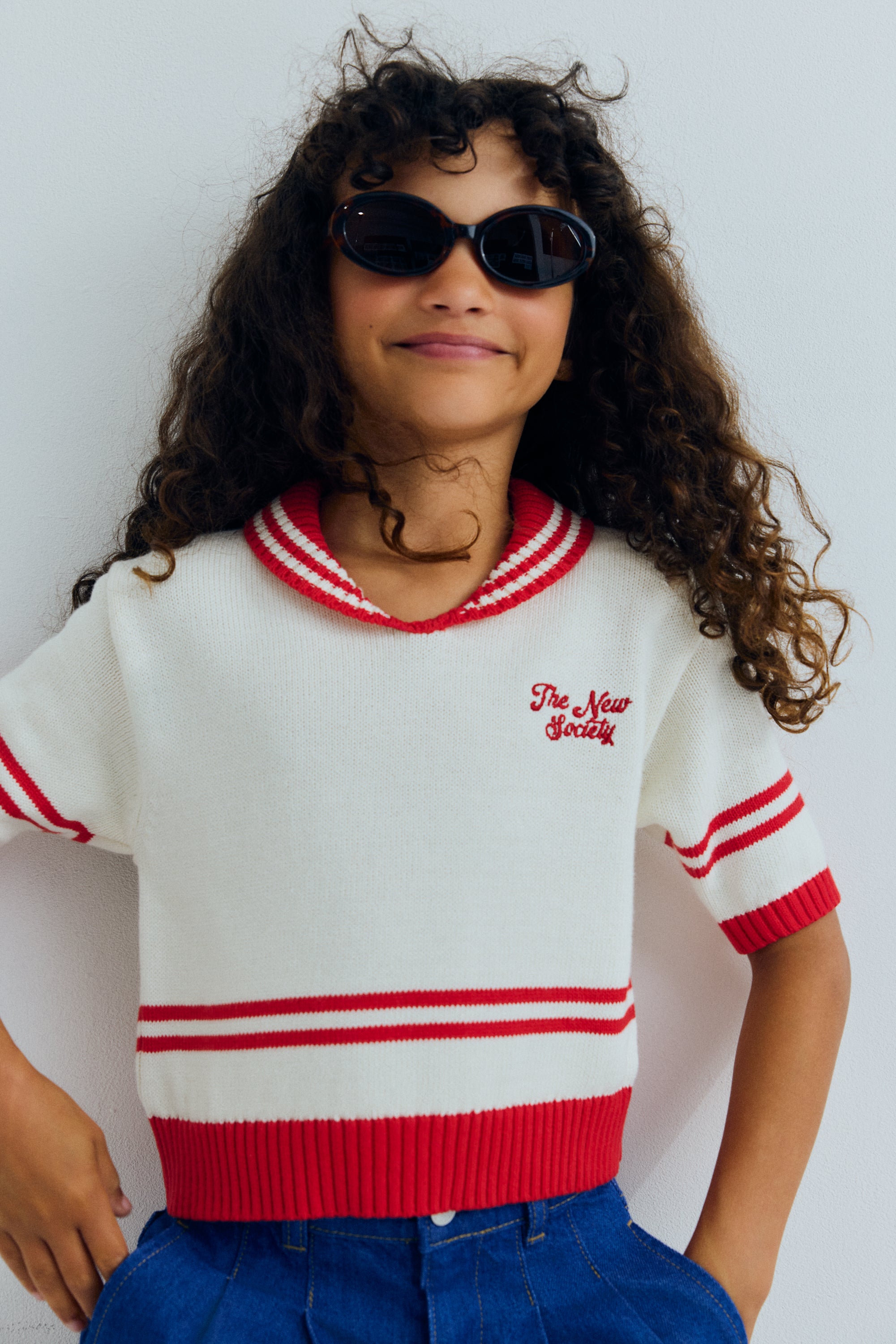 A lightweight knit polo featuring contrast trims and a new branded logo embroidered on the chest for a subtle, stylish touch.