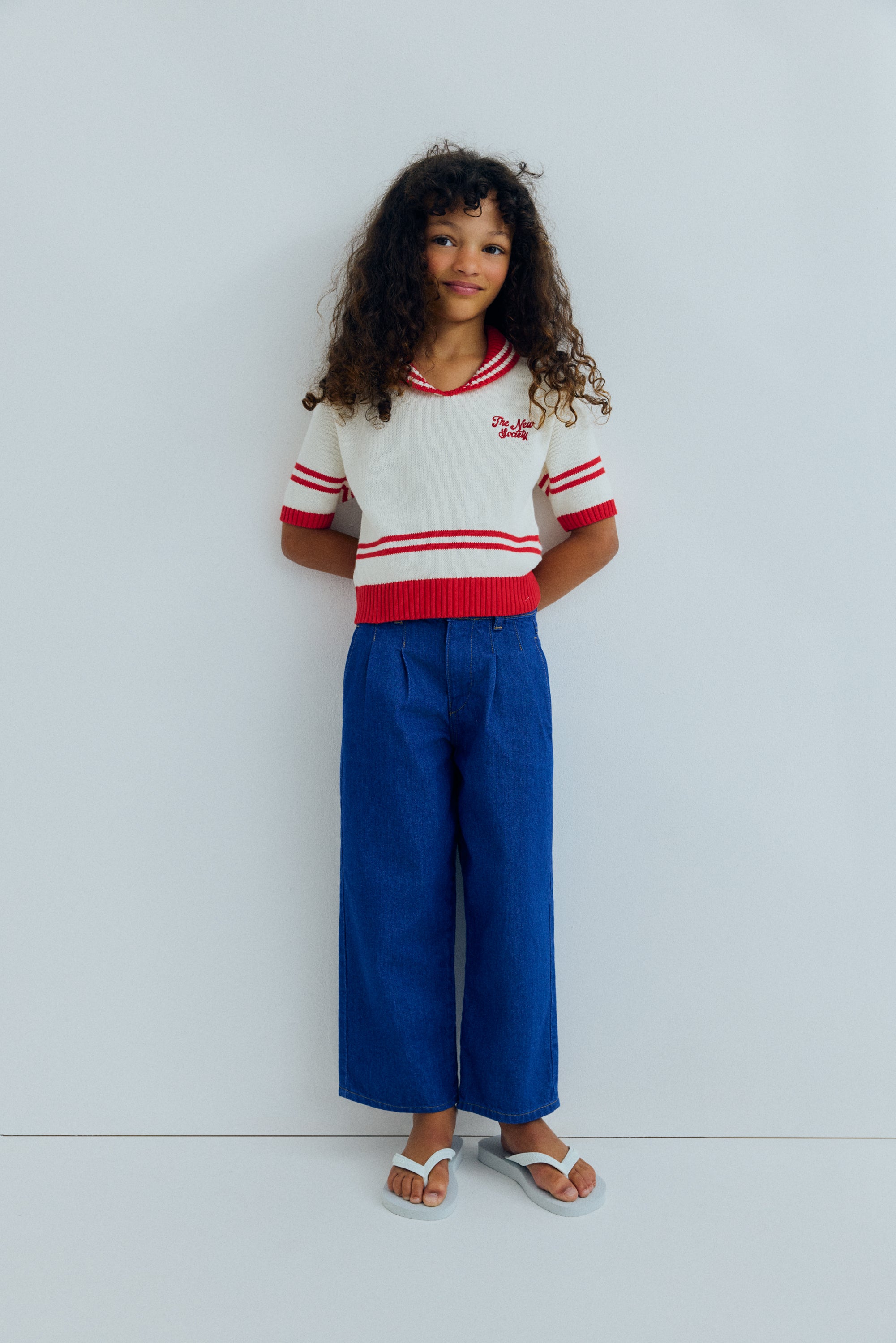 A lightweight knit polo featuring contrast trims and a new branded logo embroidered on the chest for a subtle, stylish touch.