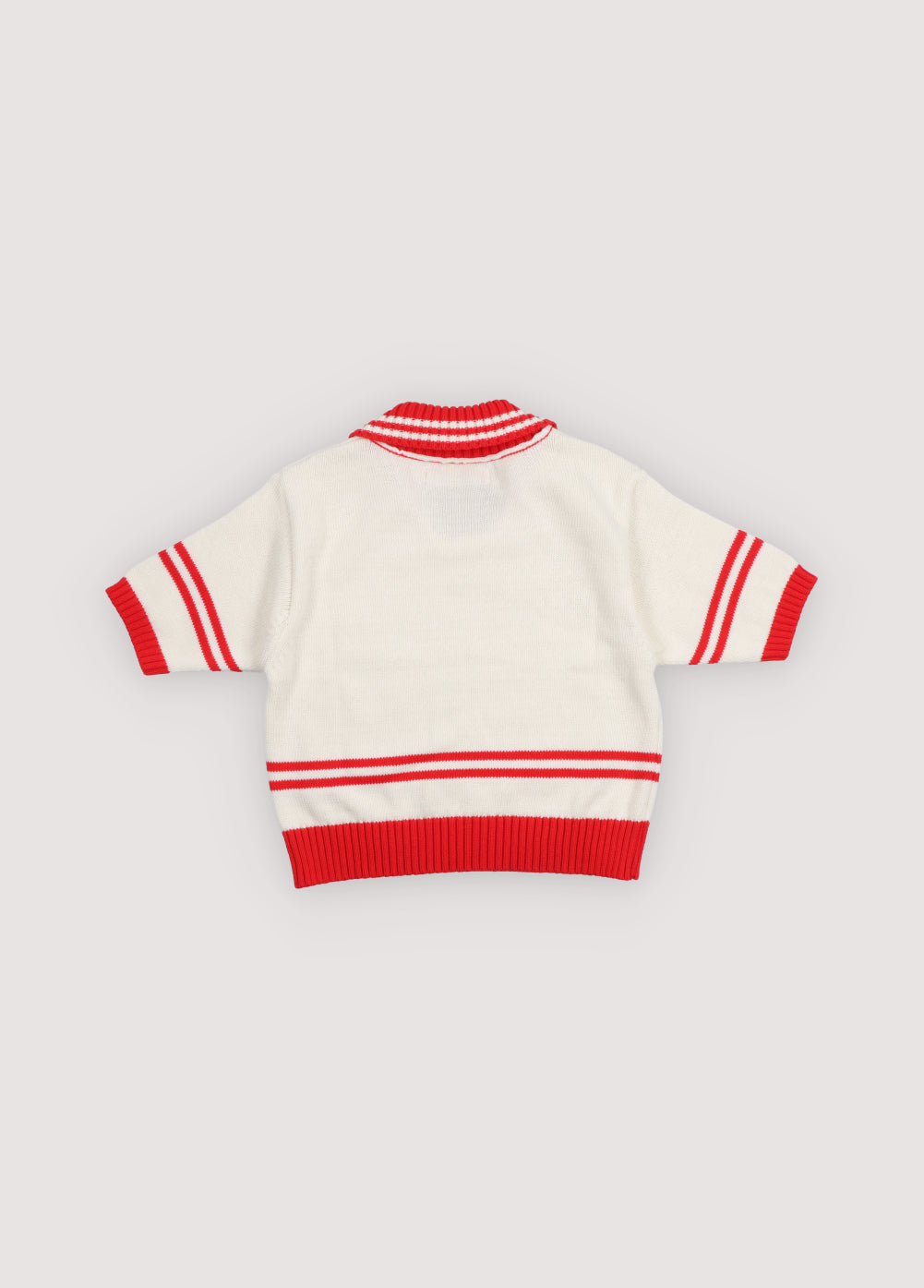 A lightweight knit polo featuring contrast trims and a new branded logo embroidered on the chest for a subtle, stylish touch.