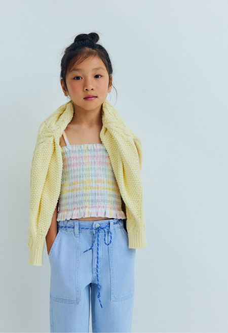 One of our best selling knits, this sweater features a beautiful textured knit and pleated shoulder details for a distinctive look. Available in two colours.