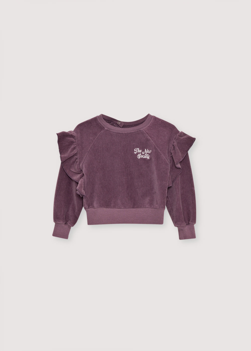 Velvet corduroy jersey sweatshirt with a unique ruffle detail on the shoulders and brand embroidery on the chest. It has an opening at shoulder with snaps. It comes with matching pants to complete the look.