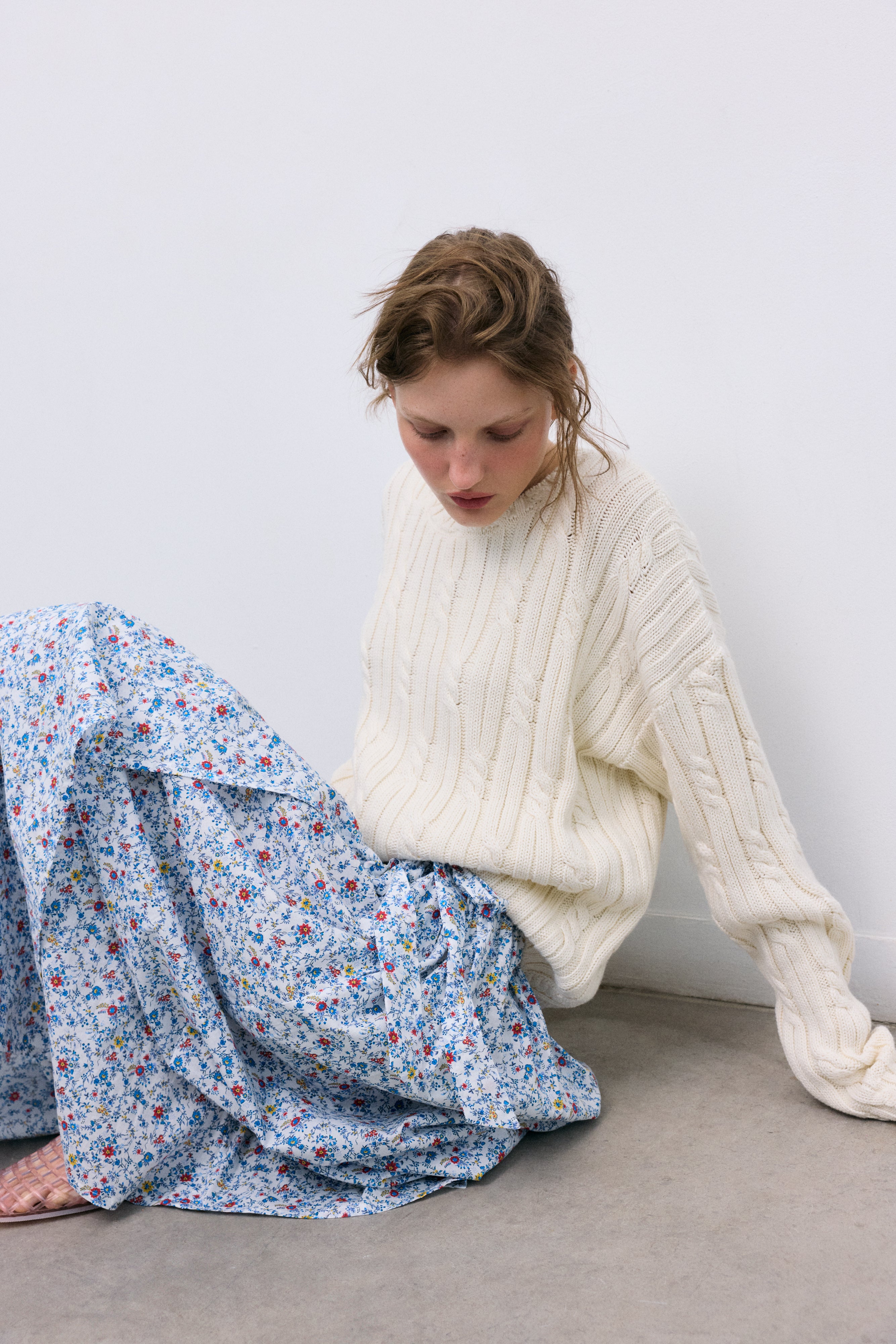 Bring a touch of timeless femininity to your wardrobe with this blue floral skirt, perfect for elevating both casual and polished looks