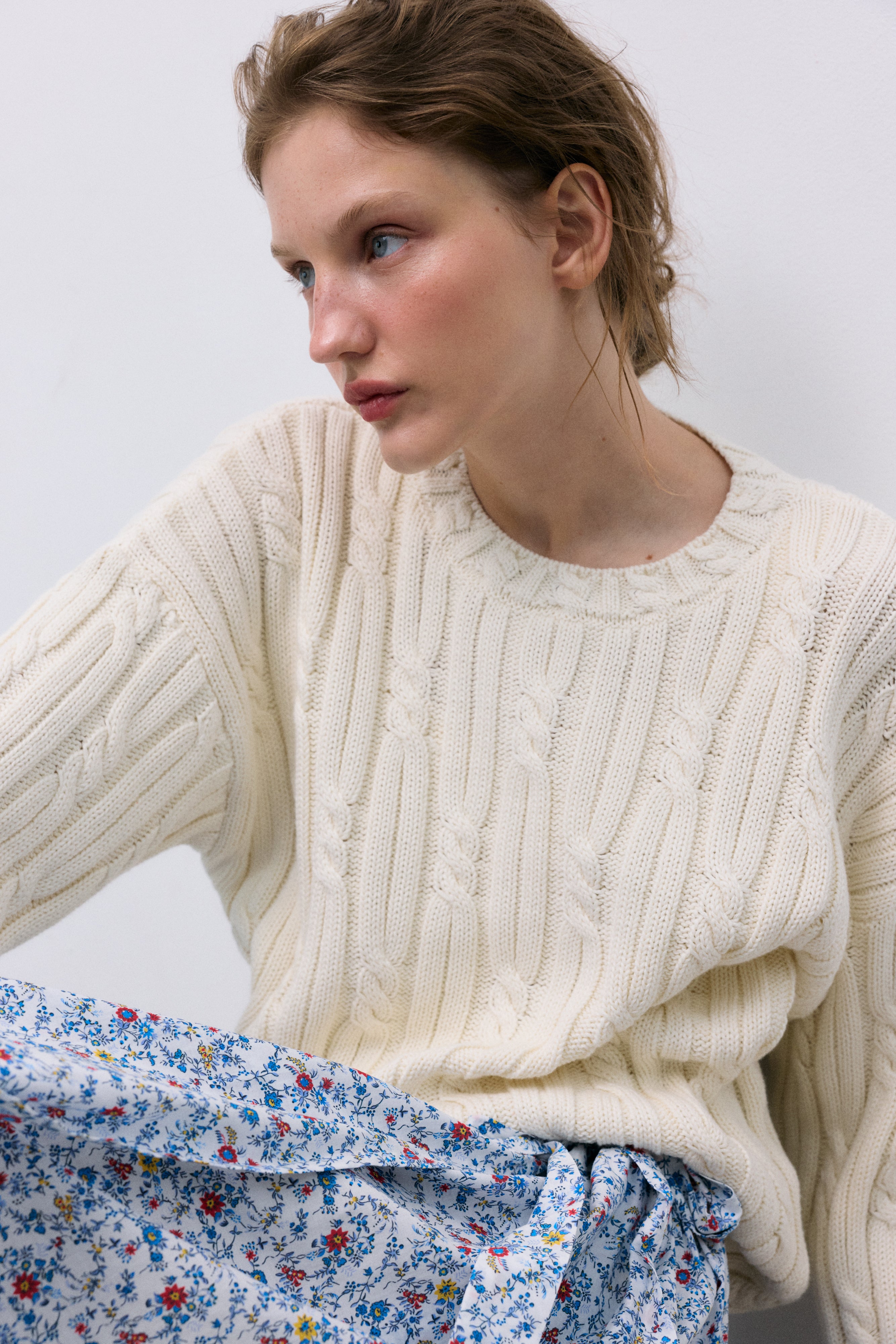 Bring a touch of timeless femininity to your wardrobe with this blue floral skirt, perfect for elevating both casual and polished looks