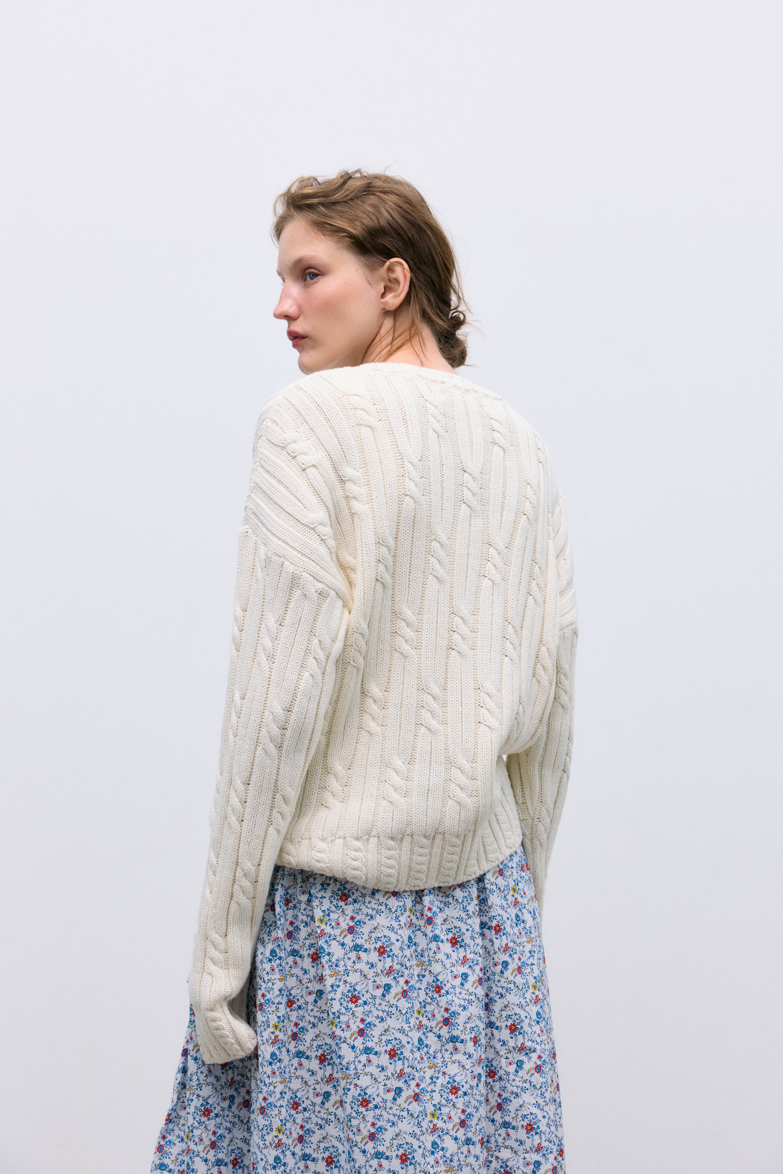 Bring a touch of timeless femininity to your wardrobe with this blue floral skirt, perfect for elevating both casual and polished looks