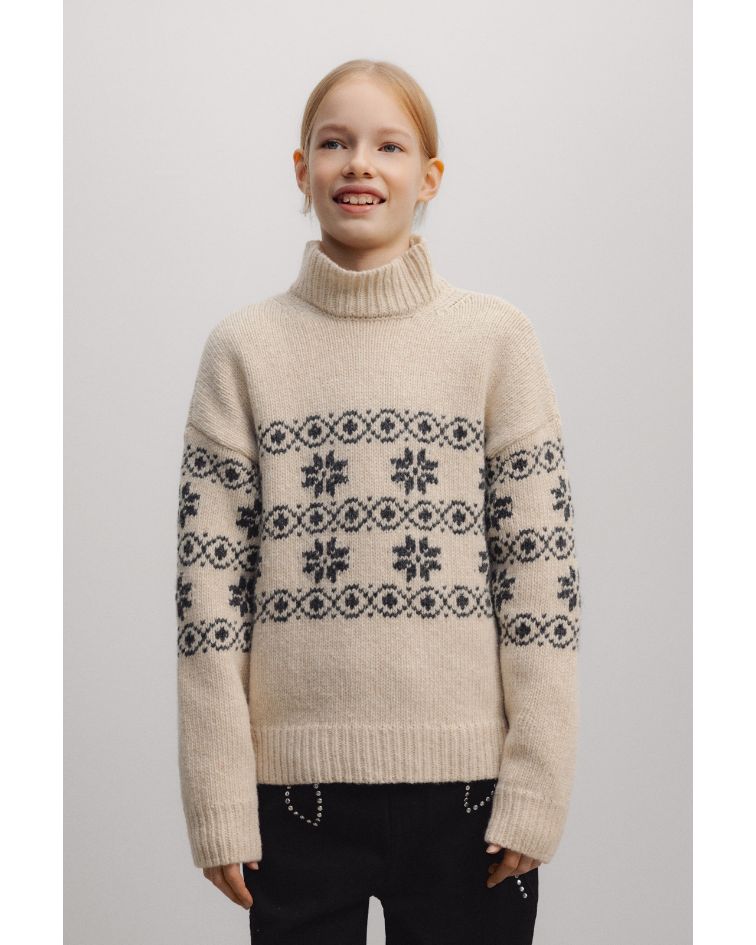 The Lilo Woman Jumper blends timeless Nordic-inspired jacquard detailing with a soft, cosy knit for effortless winter style.