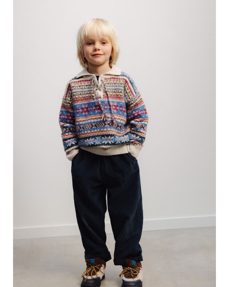 The Caia Polo is a cosy and distinctive knitwear piece, designed to combine warmth, comfort and The New Society’s thoughtful approach to children’s wear