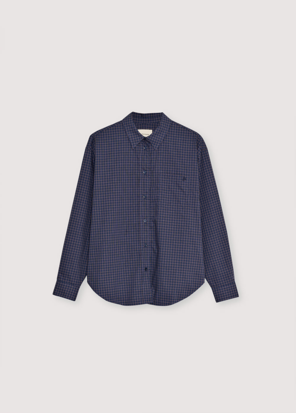 Cotton checkered shirt with tone-on-tone buttons and a patch pocket on the front with brand embroidery. It has a matching scarf available to complete the look.