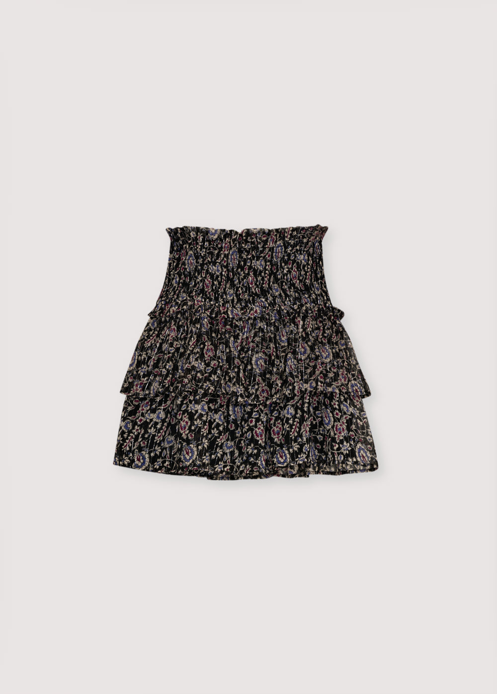 Viscose skirt with lurex and a print design. It features smocking detail at the top and a double ruffled hem.
