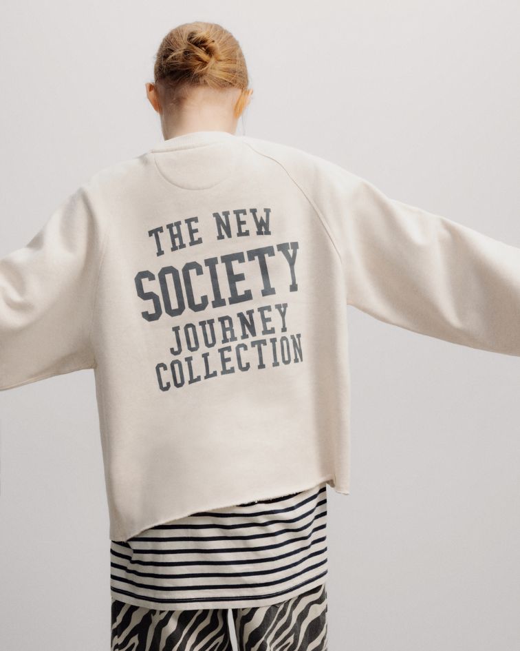 Crafted from soft melange cotton, the&nbsp;Fog Teen Sweatshirt combines a relaxed silhouette with considered design details, offering a fresh interpretation of an everyday essential. 
