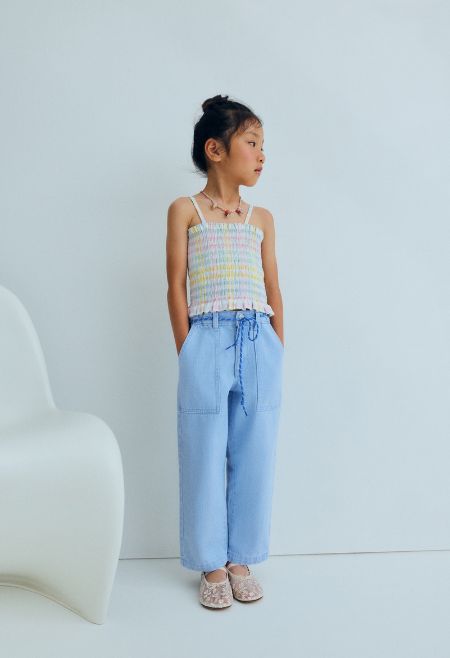 Classic baggy style pants in washed denim with an adjustable waistband with internal elastic, topstitched pockets, and brand embroidery on the back for a relaxed, stylish look.