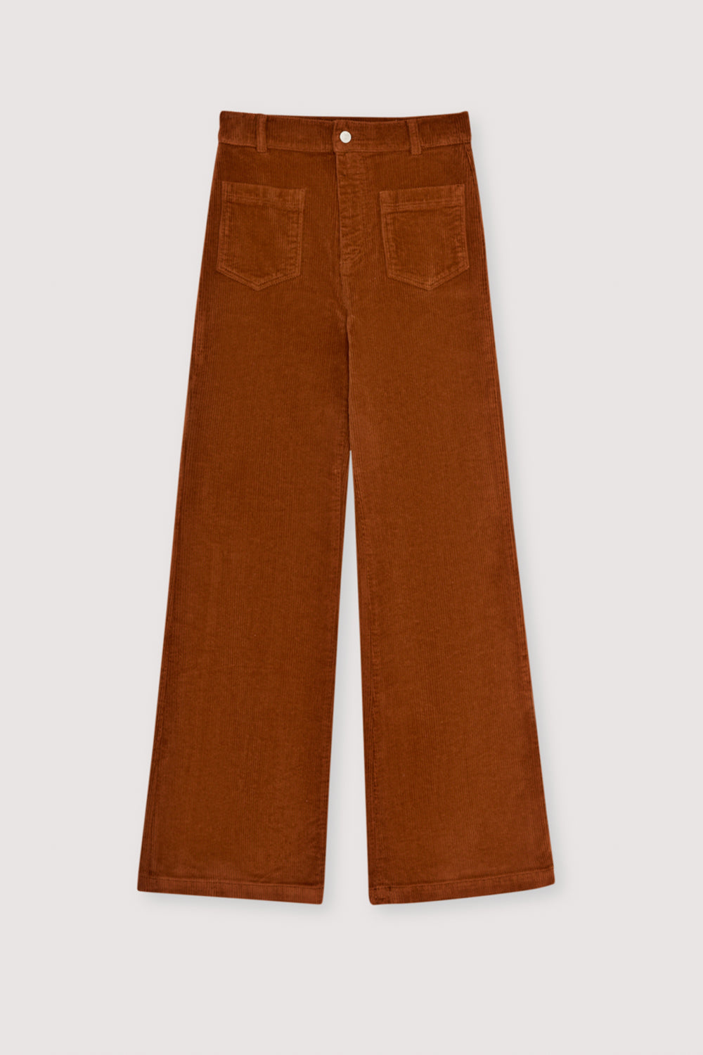 Brown corduroy pants on a light gray background. Woman Collection AW25 The New Society